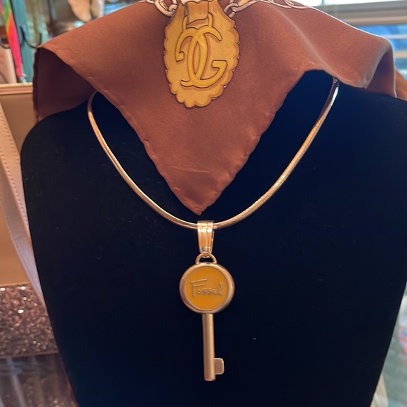 Fossil emblem re-purposed Sz 3.25 long 2 inches wide.  Yellow accent in middle. - Picture 4 of 8